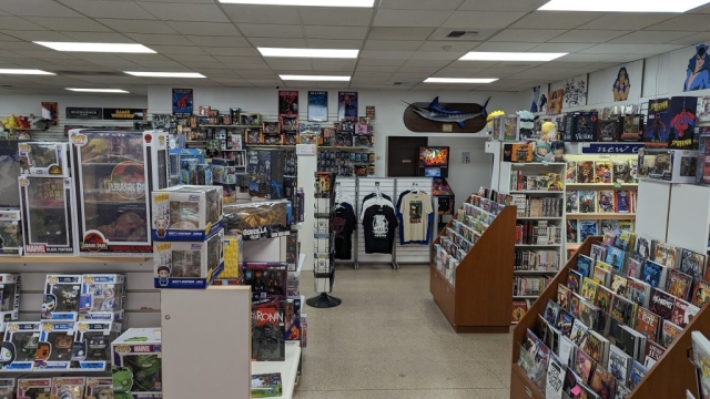 Sales floor with many comics and tshirts