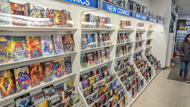 PXL_20221216_233115973 New Comics wall filled with new comic books at Muse Comics